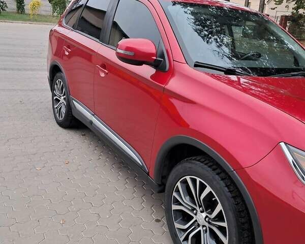 Мицубиси Аутлендер 2016 в Жашкове на Automoto.ua Красный Мицубиси Аутлендер, объемом двигателя 2.36 л и пробегом 270 тыс. км за 12500 $, фото 2 на Automoto.ua