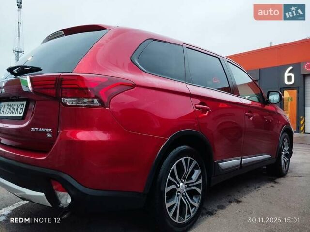 Красный Мицубиси Аутлендер, объемом двигателя 2.36 л и пробегом 118 тыс. км за 14000 $, фото 13 на Automoto.ua
