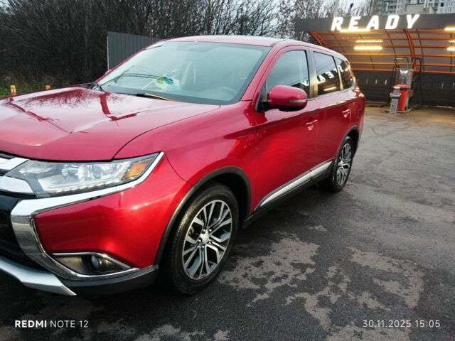 Червоний Міцубісі Аутлендер, об'ємом двигуна 2.4 л та пробігом 117 тис. км за 14000 $, фото 2 на Automoto.ua