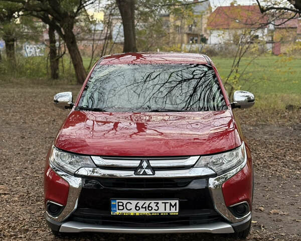 Червоний Міцубісі Аутлендер, об'ємом двигуна 2.36 л та пробігом 190 тис. км за 12000 $, фото 1 на Automoto.ua