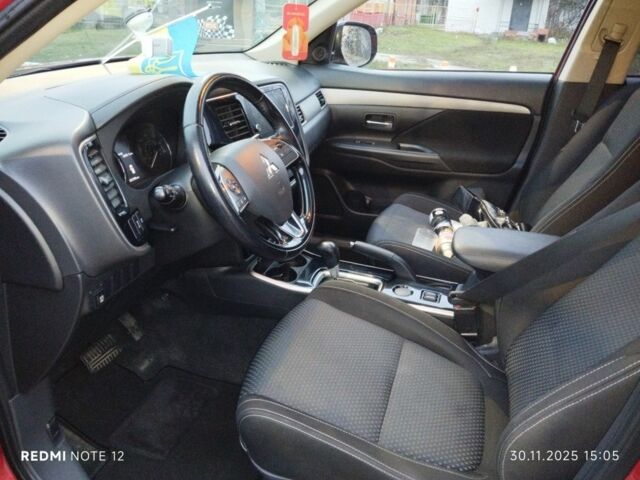 Червоний Міцубісі Аутлендер, об'ємом двигуна 2.4 л та пробігом 117 тис. км за 14000 $, фото 4 на Automoto.ua