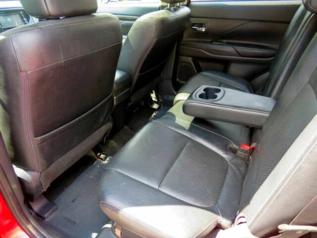 Красный Мицубиси Аутлендер, объемом двигателя 2.4 л и пробегом 70 тыс. км за 2400 $, фото 9 на Automoto.ua