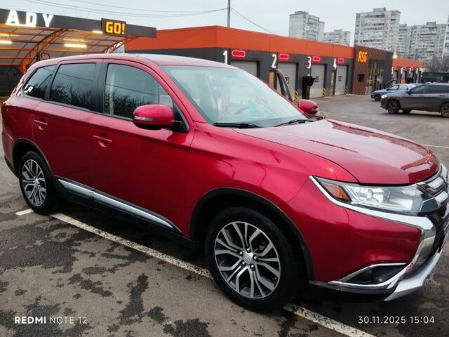 Червоний Міцубісі Аутлендер, об'ємом двигуна 2.4 л та пробігом 117 тис. км за 14000 $, фото 1 на Automoto.ua