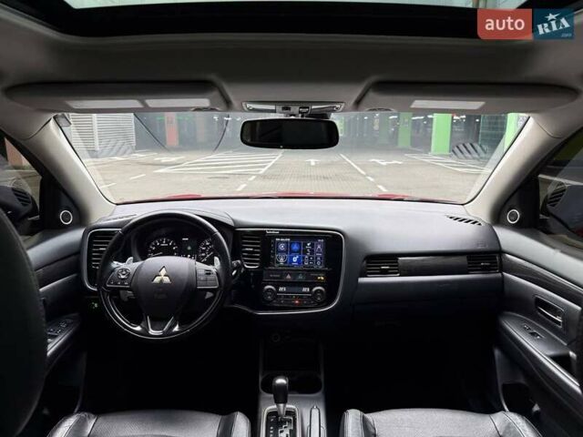 Красный Мицубиси Аутлендер, объемом двигателя 3 л и пробегом 167 тыс. км за 16990 $, фото 29 на Automoto.ua