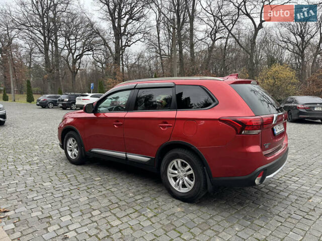 Красный Мицубиси Аутлендер, объемом двигателя 2.4 л и пробегом 225 тыс. км за 11900 $, фото 7 на Automoto.ua