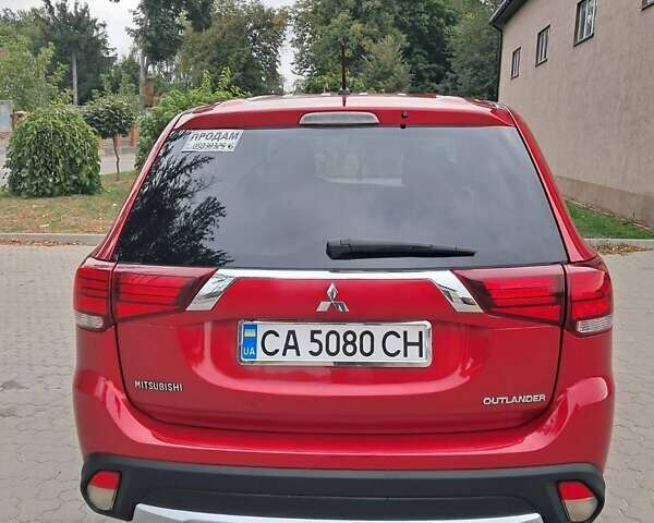 Мицубиси Аутлендер 2016 в Жашкове на Automoto.ua Красный Мицубиси Аутлендер, объемом двигателя 2.36 л и пробегом 270 тыс. км за 12500 $, фото 1 на Automoto.ua