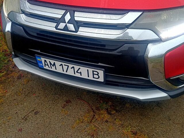 Червоний Міцубісі Аутлендер, об'ємом двигуна 2.4 л та пробігом 131 тис. км за 16300 $, фото 1 на Automoto.ua