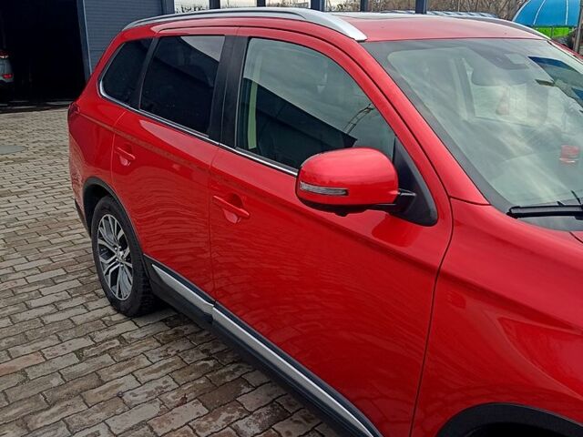 Червоний Міцубісі Аутлендер, об'ємом двигуна 2.4 л та пробігом 131 тис. км за 16300 $, фото 9 на Automoto.ua