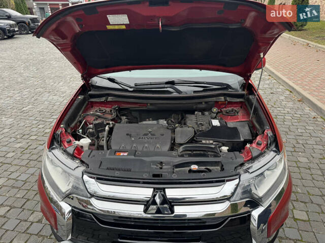 Красный Мицубиси Аутлендер, объемом двигателя 2.4 л и пробегом 225 тыс. км за 11900 $, фото 14 на Automoto.ua