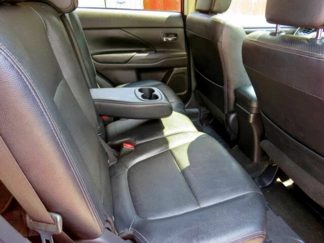 Червоний Міцубісі Аутлендер, об'ємом двигуна 2.4 л та пробігом 71 тис. км за 10800 $, фото 11 на Automoto.ua