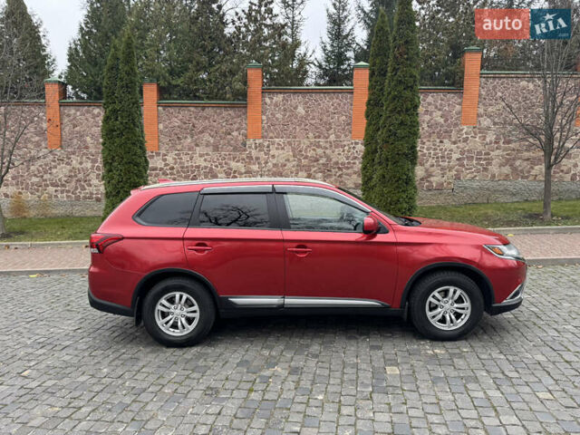 Красный Мицубиси Аутлендер, объемом двигателя 2.4 л и пробегом 225 тыс. км за 11900 $, фото 4 на Automoto.ua
