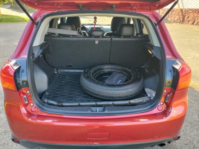 Красный Мицубиси Аутлендер, объемом двигателя 2.4 л и пробегом 185 тыс. км за 12200 $, фото 23 на Automoto.ua