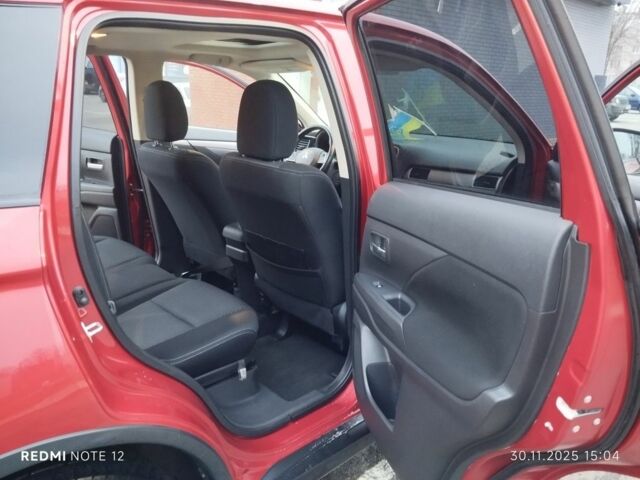 Червоний Міцубісі Аутлендер, об'ємом двигуна 2.4 л та пробігом 117 тис. км за 14000 $, фото 9 на Automoto.ua