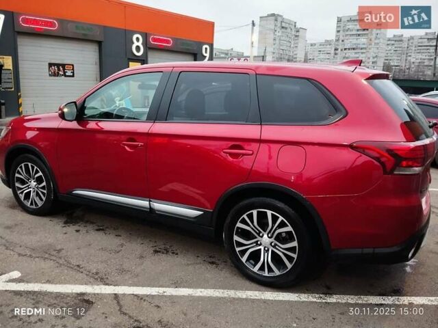Красный Мицубиси Аутлендер, объемом двигателя 2.36 л и пробегом 118 тыс. км за 14000 $, фото 11 на Automoto.ua