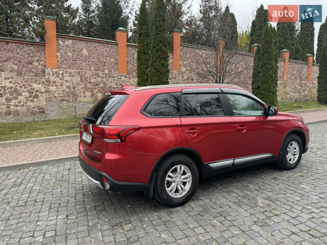 Красный Мицубиси Аутлендер, объемом двигателя 2.4 л и пробегом 225 тыс. км за 11900 $, фото 5 на Automoto.ua