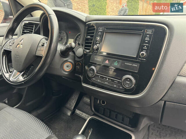 Красный Мицубиси Аутлендер, объемом двигателя 2.4 л и пробегом 225 тыс. км за 11900 $, фото 11 на Automoto.ua