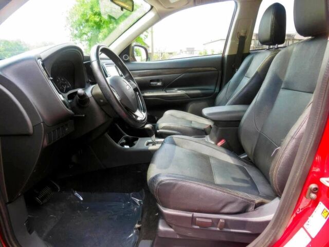 Червоний Міцубісі Аутлендер, об'ємом двигуна 2.4 л та пробігом 71 тис. км за 10800 $, фото 9 на Automoto.ua