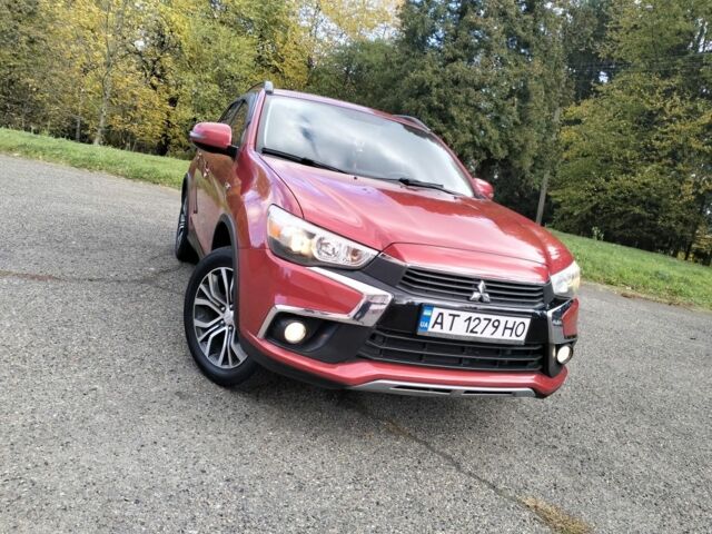 Красный Мицубиси Аутлендер, объемом двигателя 2.4 л и пробегом 185 тыс. км за 12200 $, фото 3 на Automoto.ua