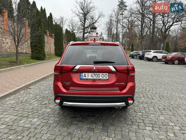 Красный Мицубиси Аутлендер, объемом двигателя 2.4 л и пробегом 225 тыс. км за 11900 $, фото 6 на Automoto.ua