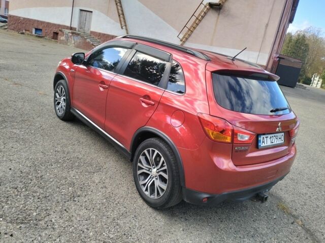 Красный Мицубиси Аутлендер, объемом двигателя 2.4 л и пробегом 185 тыс. км за 12200 $, фото 6 на Automoto.ua