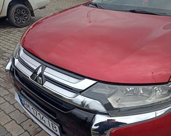 Красный Мицубиси Аутлендер, объемом двигателя 2.36 л и пробегом 131 тыс. км за 16300 $, фото 8 на Automoto.ua