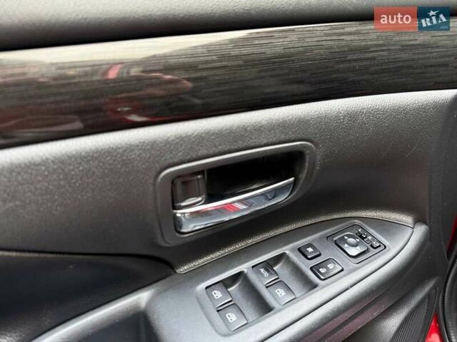 Красный Мицубиси Аутлендер, объемом двигателя 3 л и пробегом 167 тыс. км за 16990 $, фото 19 на Automoto.ua