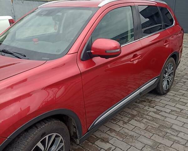 Красный Мицубиси Аутлендер, объемом двигателя 2.36 л и пробегом 131 тыс. км за 16300 $, фото 5 на Automoto.ua