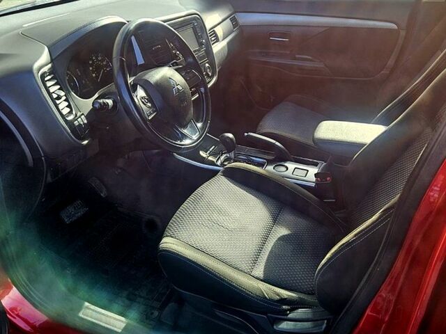 Красный Мицубиси Аутлендер, объемом двигателя 2.4 л и пробегом 174 тыс. км за 14300 $, фото 3 на Automoto.ua