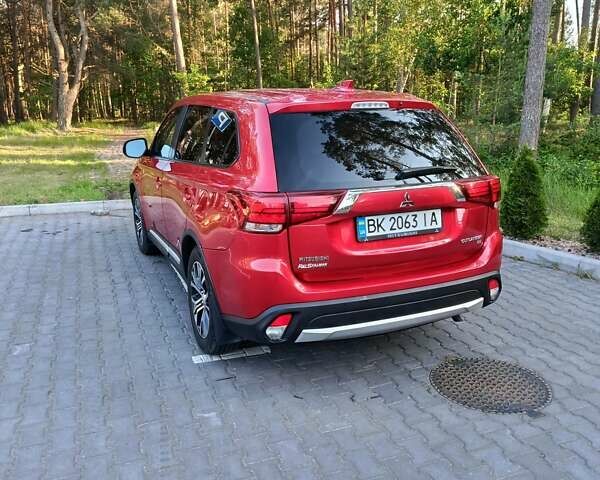 Червоний Міцубісі Аутлендер, об'ємом двигуна 2.4 л та пробігом 133 тис. км за 14700 $, фото 9 на Automoto.ua