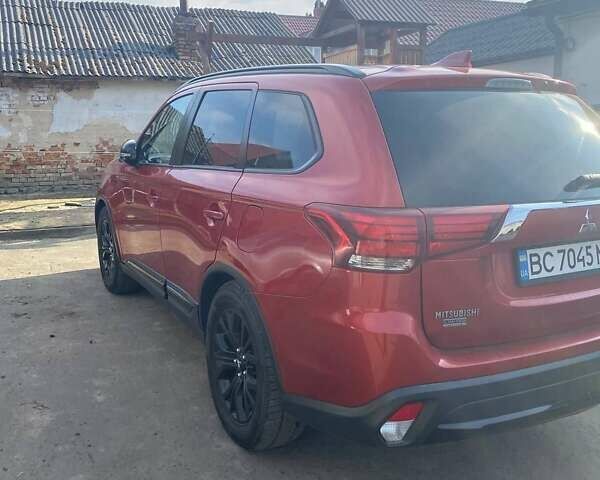 Красный Мицубиси Аутлендер, объемом двигателя 2.36 л и пробегом 60 тыс. км за 15500 $, фото 14 на Automoto.ua