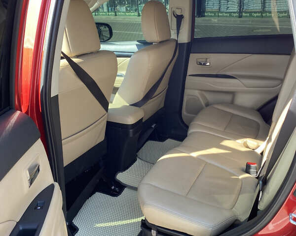 Красный Мицубиси Аутлендер, объемом двигателя 2.4 л и пробегом 113 тыс. км за 15900 $, фото 12 на Automoto.ua