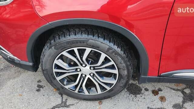 Красный Мицубиси Аутлендер, объемом двигателя 2.36 л и пробегом 80 тыс. км за 16500 $, фото 7 на Automoto.ua