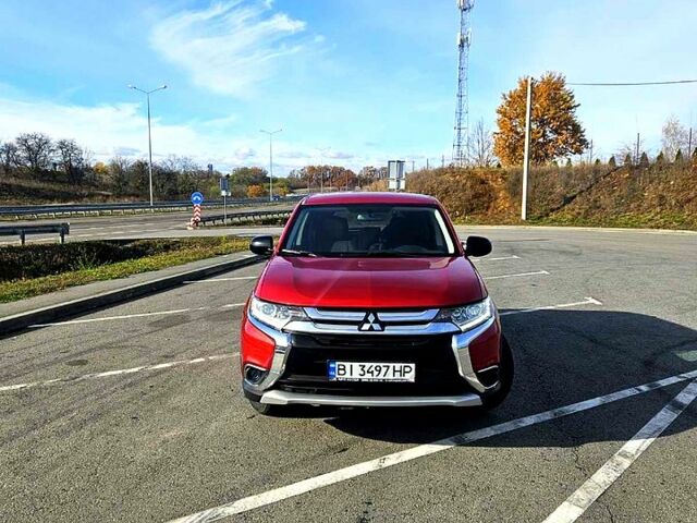 Красный Мицубиси Аутлендер, объемом двигателя 2.4 л и пробегом 174 тыс. км за 14300 $, фото 2 на Automoto.ua