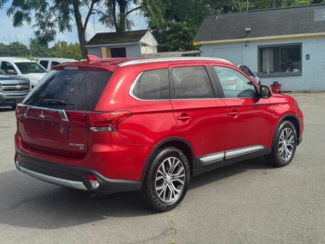 Красный Мицубиси Аутлендер, объемом двигателя 2.4 л и пробегом 51 тыс. км за 8900 $, фото 3 на Automoto.ua