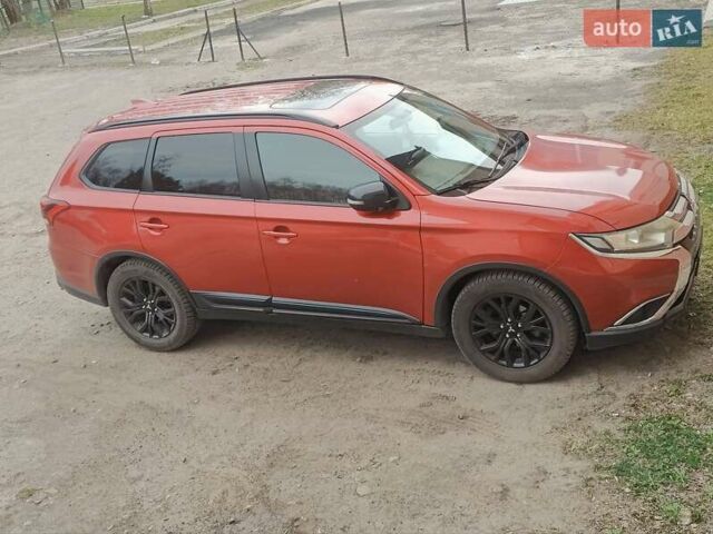 Красный Мицубиси Аутлендер, объемом двигателя 2.36 л и пробегом 60 тыс. км за 15500 $, фото 9 на Automoto.ua