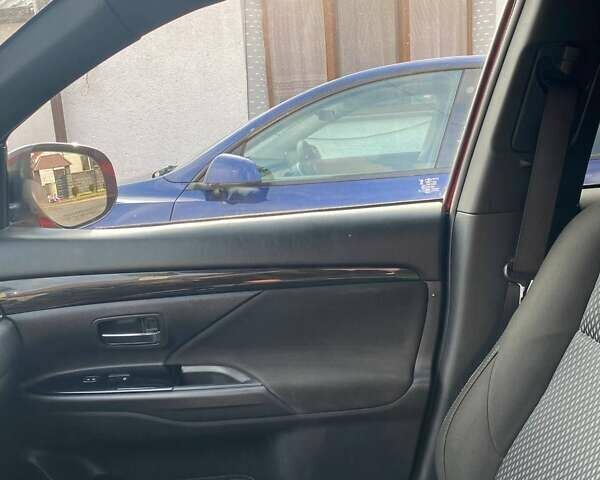 Красный Мицубиси Аутлендер, объемом двигателя 2.36 л и пробегом 60 тыс. км за 15500 $, фото 24 на Automoto.ua