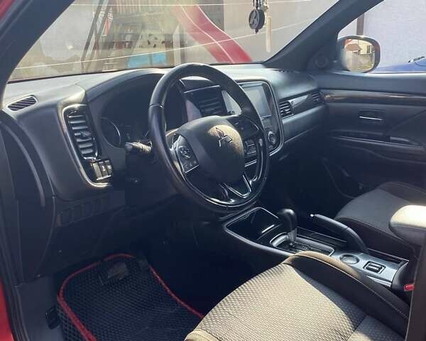 Красный Мицубиси Аутлендер, объемом двигателя 2.36 л и пробегом 60 тыс. км за 15500 $, фото 20 на Automoto.ua