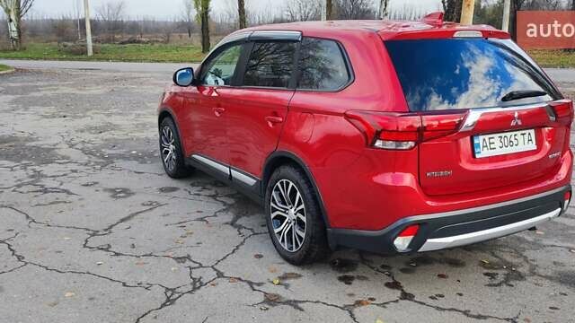 Красный Мицубиси Аутлендер, объемом двигателя 2.36 л и пробегом 80 тыс. км за 16500 $, фото 3 на Automoto.ua