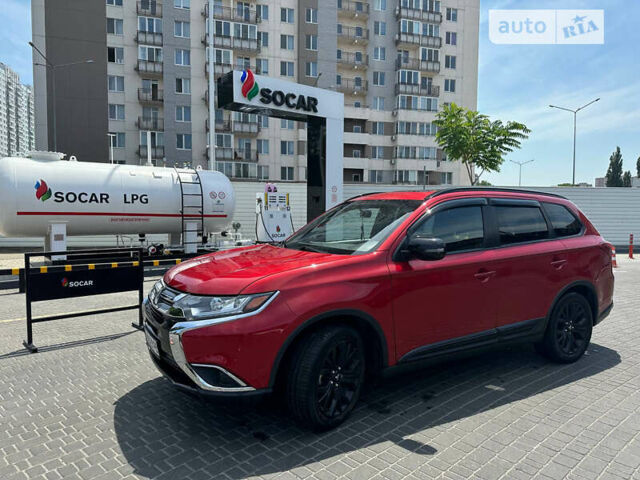 Красный Мицубиси Аутлендер, объемом двигателя 2.4 л и пробегом 107 тыс. км за 16900 $, фото 9 на Automoto.ua