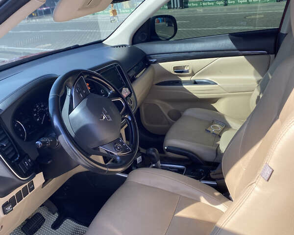 Красный Мицубиси Аутлендер, объемом двигателя 2.4 л и пробегом 113 тыс. км за 15900 $, фото 8 на Automoto.ua