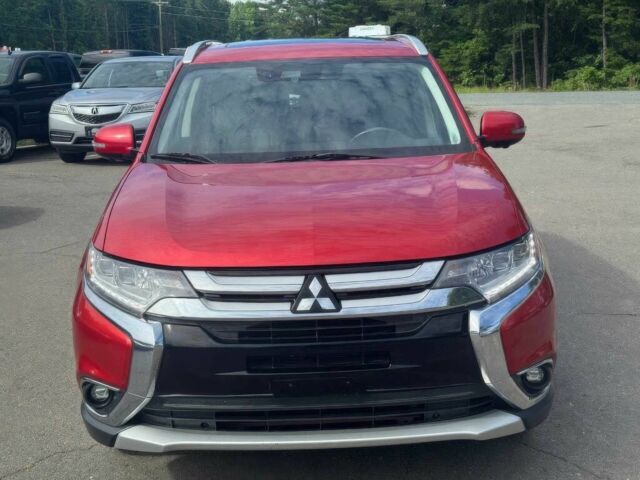 Красный Мицубиси Аутлендер, объемом двигателя 2.4 л и пробегом 51 тыс. км за 8900 $, фото 1 на Automoto.ua