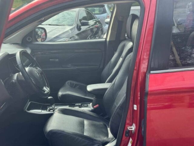 Красный Мицубиси Аутлендер, объемом двигателя 2.4 л и пробегом 51 тыс. км за 8900 $, фото 6 на Automoto.ua