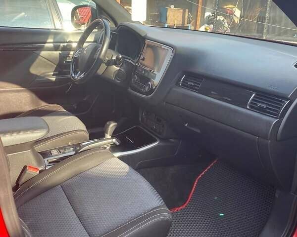 Красный Мицубиси Аутлендер, объемом двигателя 2.36 л и пробегом 60 тыс. км за 15500 $, фото 19 на Automoto.ua