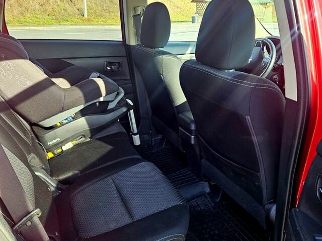 Красный Мицубиси Аутлендер, объемом двигателя 2.4 л и пробегом 174 тыс. км за 14300 $, фото 4 на Automoto.ua