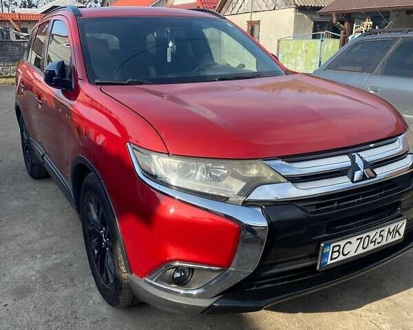 Красный Мицубиси Аутлендер, объемом двигателя 2.36 л и пробегом 60 тыс. км за 15500 $, фото 4 на Automoto.ua