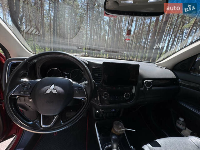 Красный Мицубиси Аутлендер, объемом двигателя 2.36 л и пробегом 133 тыс. км за 16300 $, фото 27 на Automoto.ua