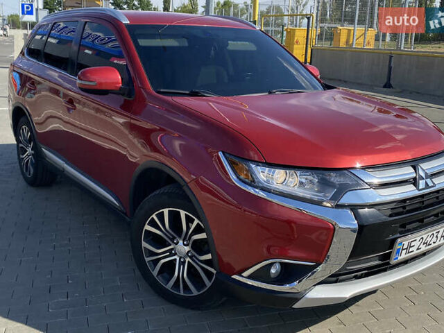 Красный Мицубиси Аутлендер, объемом двигателя 2.4 л и пробегом 113 тыс. км за 15900 $, фото 2 на Automoto.ua