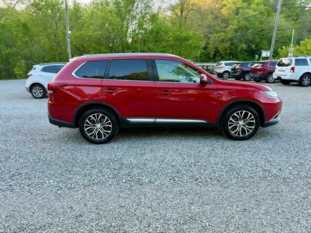 Красный Мицубиси Аутлендер, объемом двигателя 3 л и пробегом 57 тыс. км за 13200 $, фото 7 на Automoto.ua