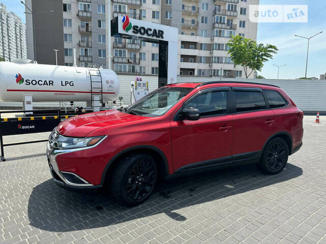 Красный Мицубиси Аутлендер, объемом двигателя 2.4 л и пробегом 107 тыс. км за 16900 $, фото 6 на Automoto.ua