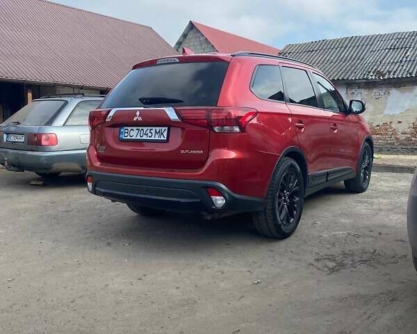 Красный Мицубиси Аутлендер, объемом двигателя 2.36 л и пробегом 60 тыс. км за 15500 $, фото 21 на Automoto.ua